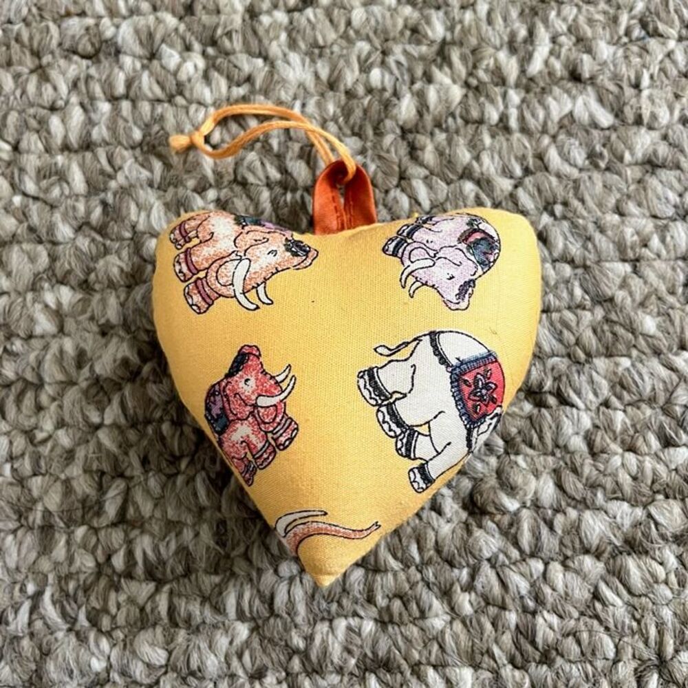 Heart-shaped ornament with elephant motif from India